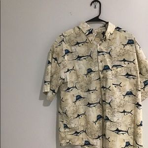 Shirt button down.Sharks roam the globe; a real !